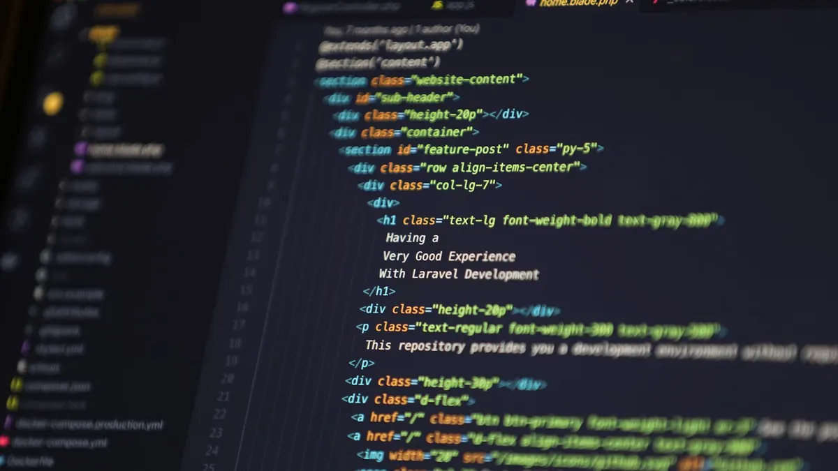 Source code displayed on a laptop screen